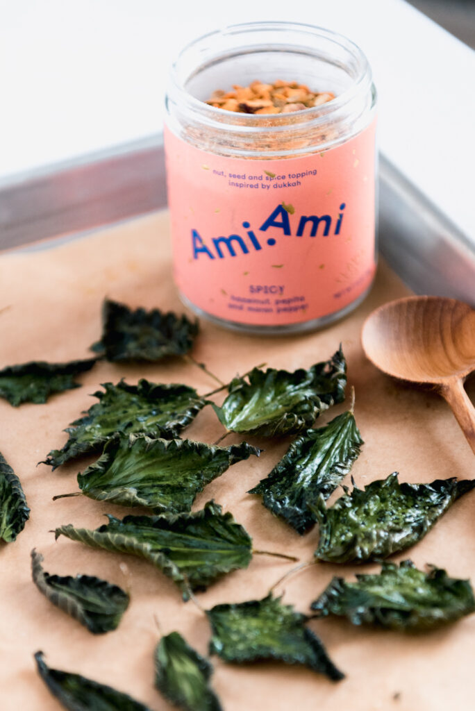 stinging nettle chips on a baking tray with ami ami spice