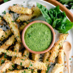 zucchini fries sprinkled with fresh herbs and green goddess dressing