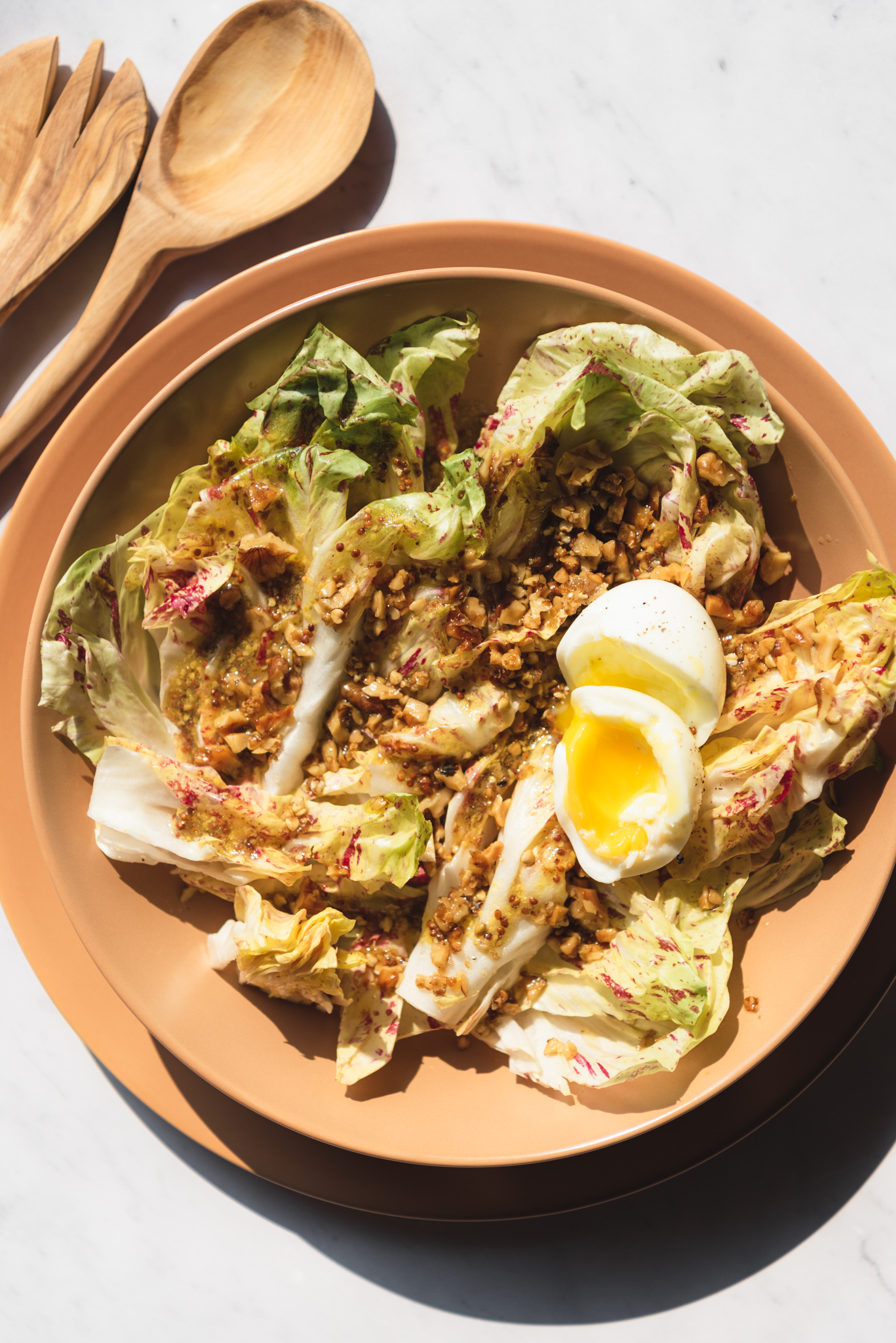 radicchio salad with walnut and mustard vinaigrette and soft boiled egg